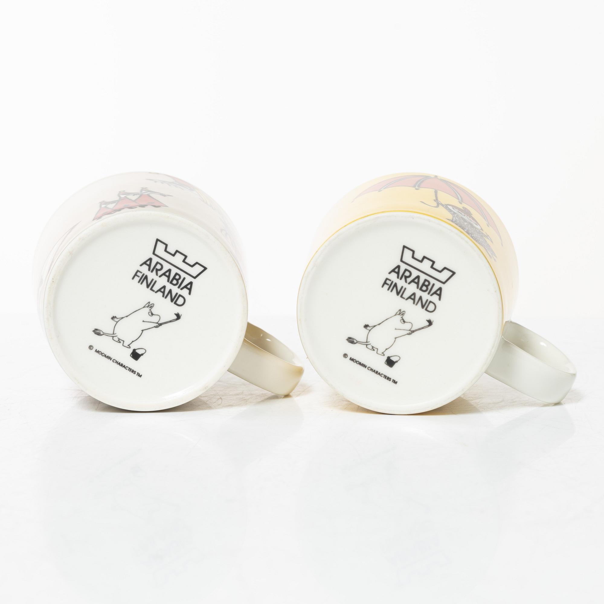 A set of 31 Moomin mugs, Arabia, Finland.