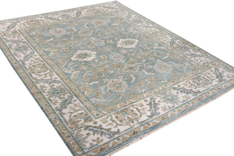 An oriental carpet with Mamluk design, c. 304 x 249 cm.