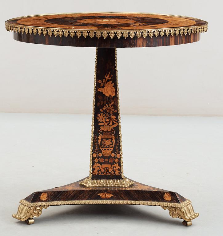 A 19th century tilt-top table.