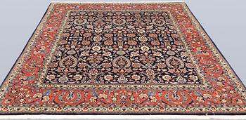 A part silk Sarouk rug, signed, approx. 240 x 208 cm.