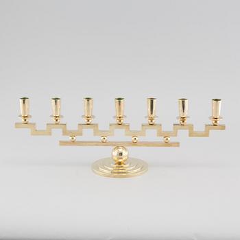 A brass candelabra, attributed to Firma Lars Holmström in Arvika, 20th cenutry.