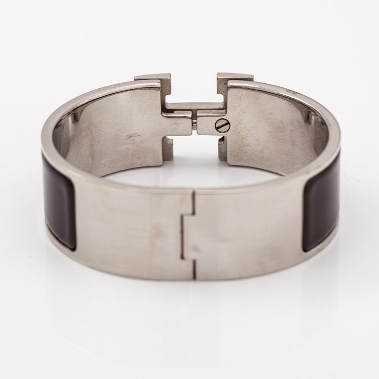 Hermès, A "H click" bracelet made of metal and enamel. arked Hermès, P, S, Made in France.