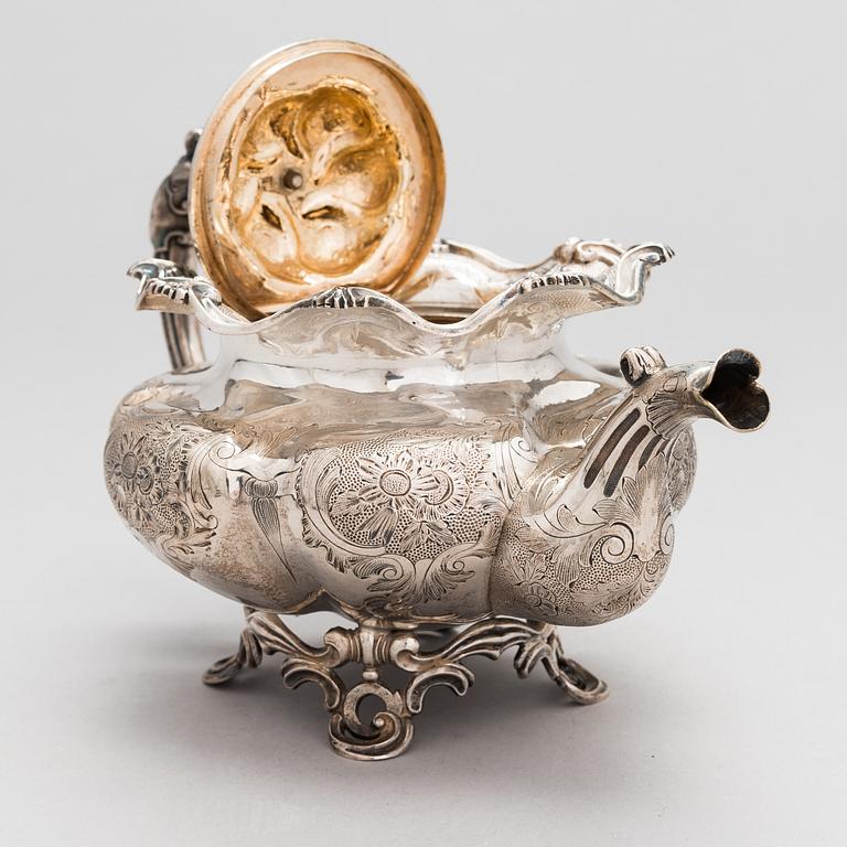 A silver teapot, unknown maker's mark F.G, assay master mark Dimitri Ilyich Tverskoy, Saint Petersburg, Russia 1844.