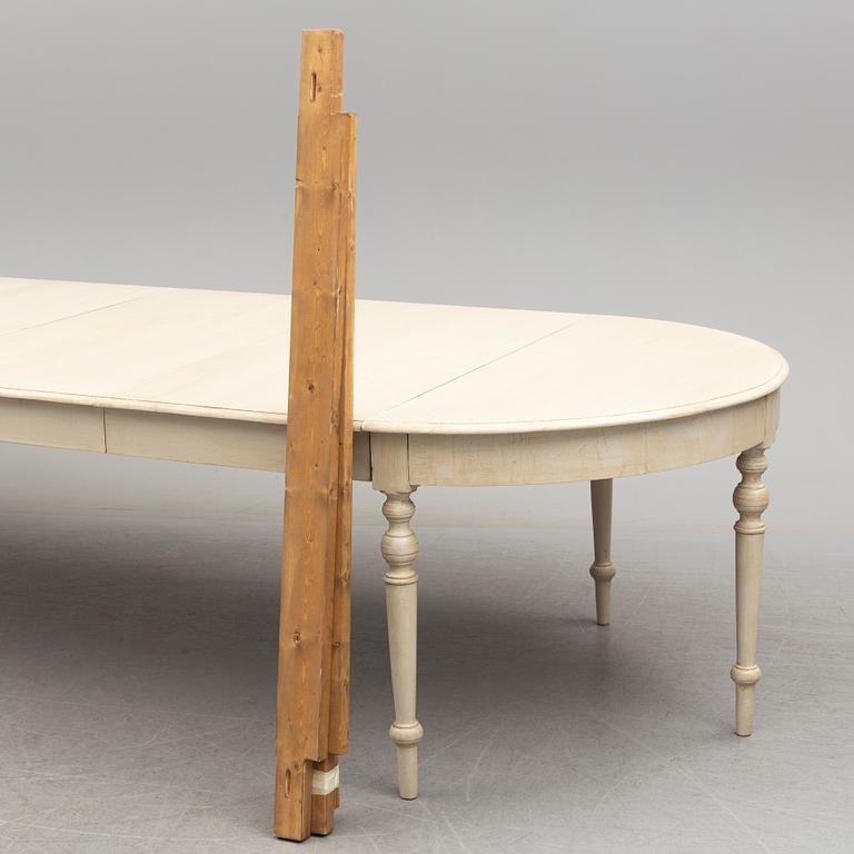 A late 19th century painted dining table.