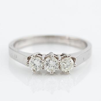 Ring, 18K white gold with three brilliant-cut diamonds.