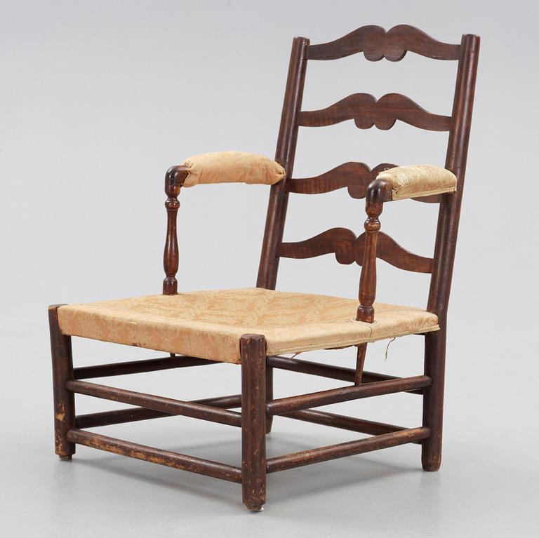 A Swedish Royal "Gripsholm" armchair.