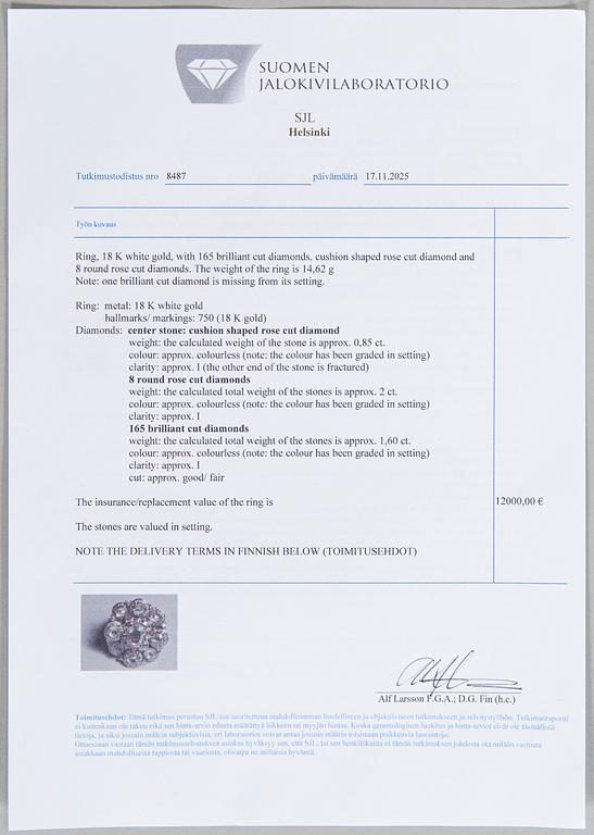 An 18K white gold ring set with rose-cut and brilliant-cut diamonds.