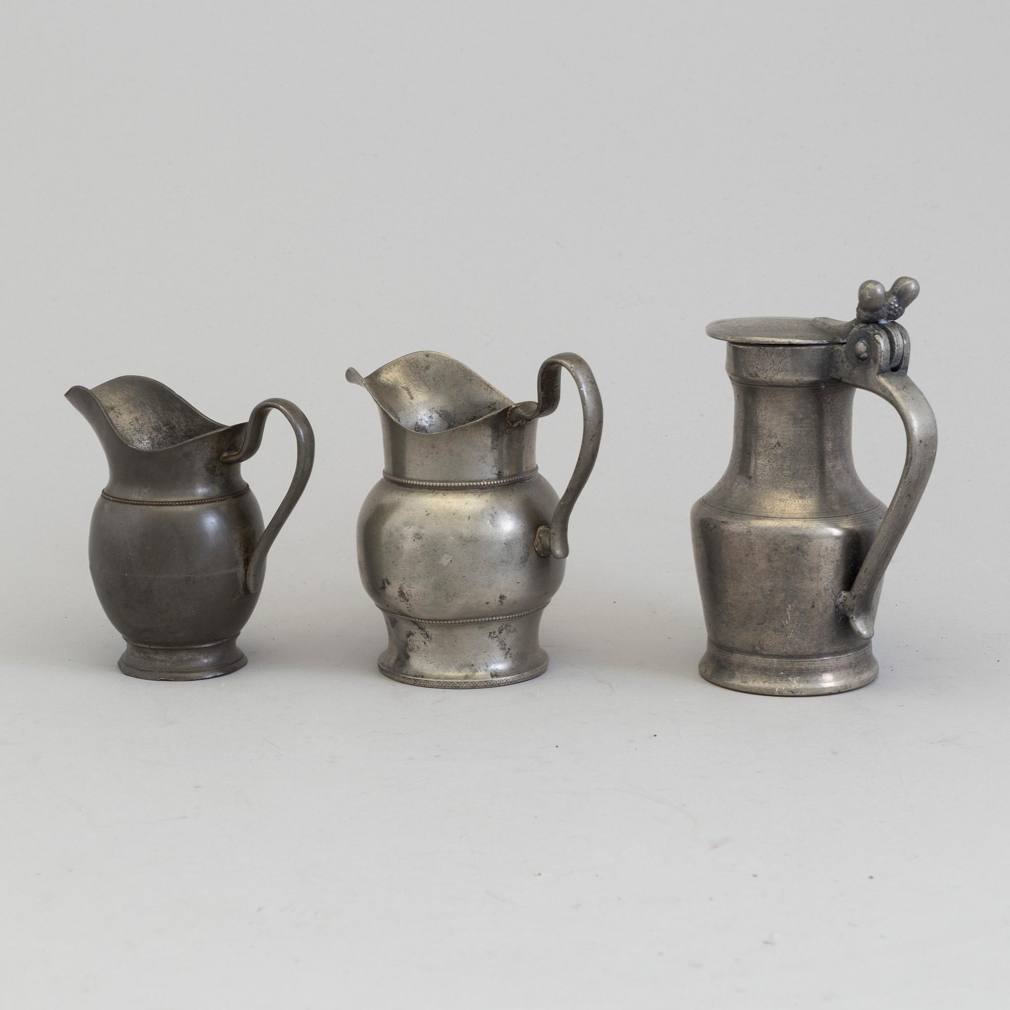 THREE PEWTER JUGS, 18th/19th century.