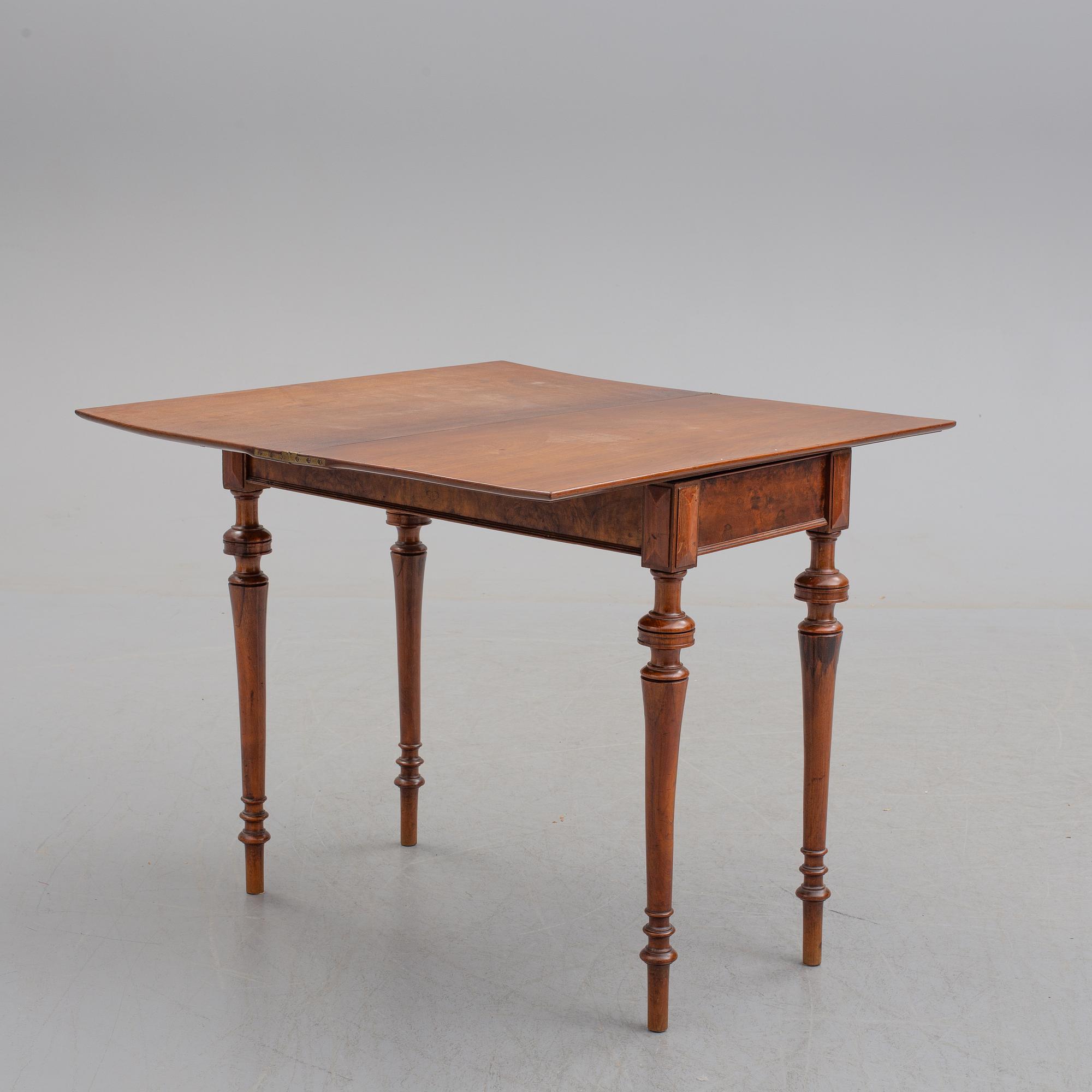 A late 19th century mahogany card table.