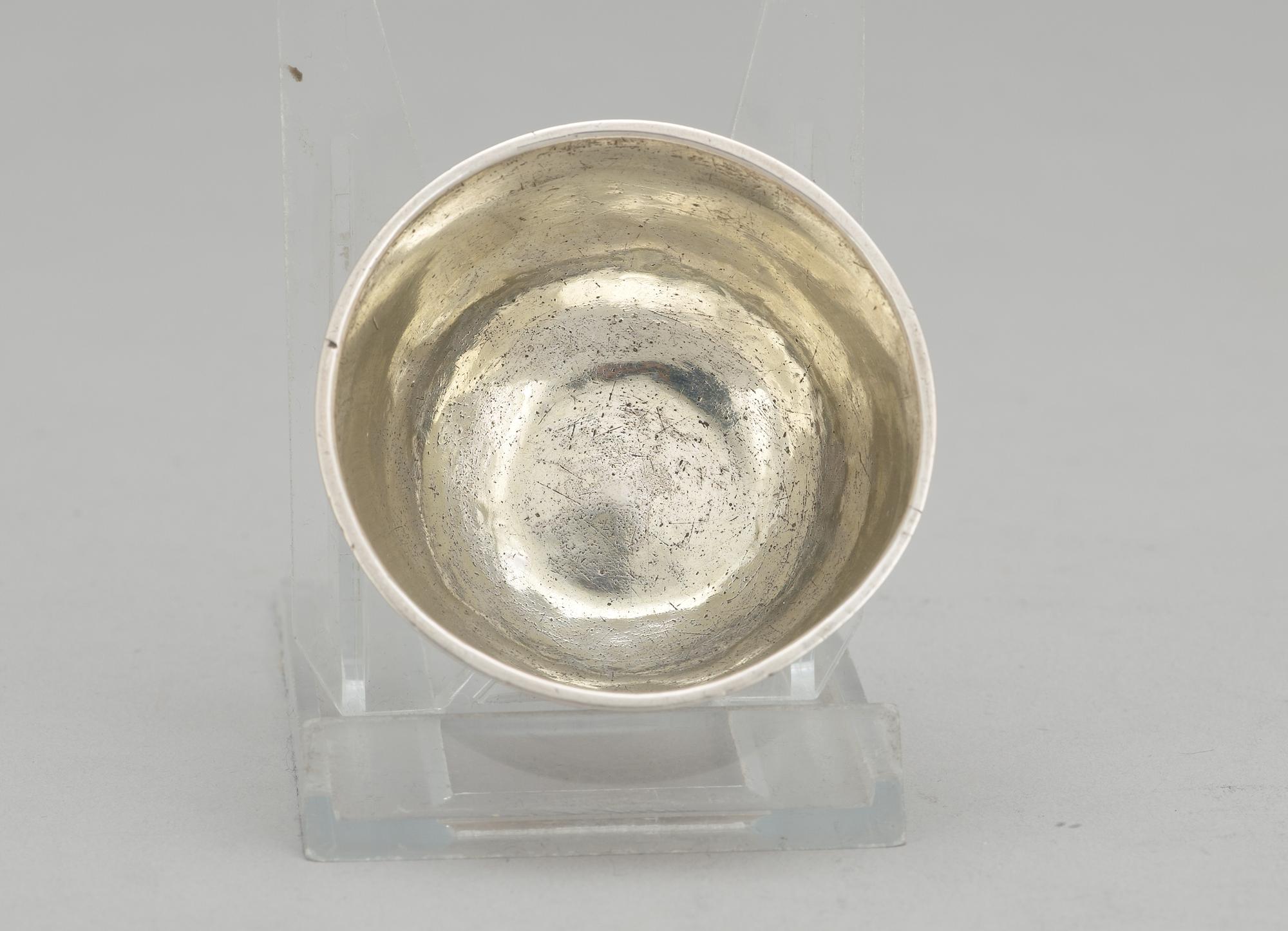 A Swedish 18th century parcel-gilt thumbler, makers mark of Johan Wickman, Hudiksvall (1750-1755 (1758)).