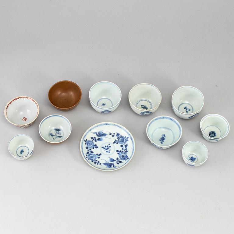 Eleven porcelain cups with one dish, Mostly Qing dynasty, 18th century.