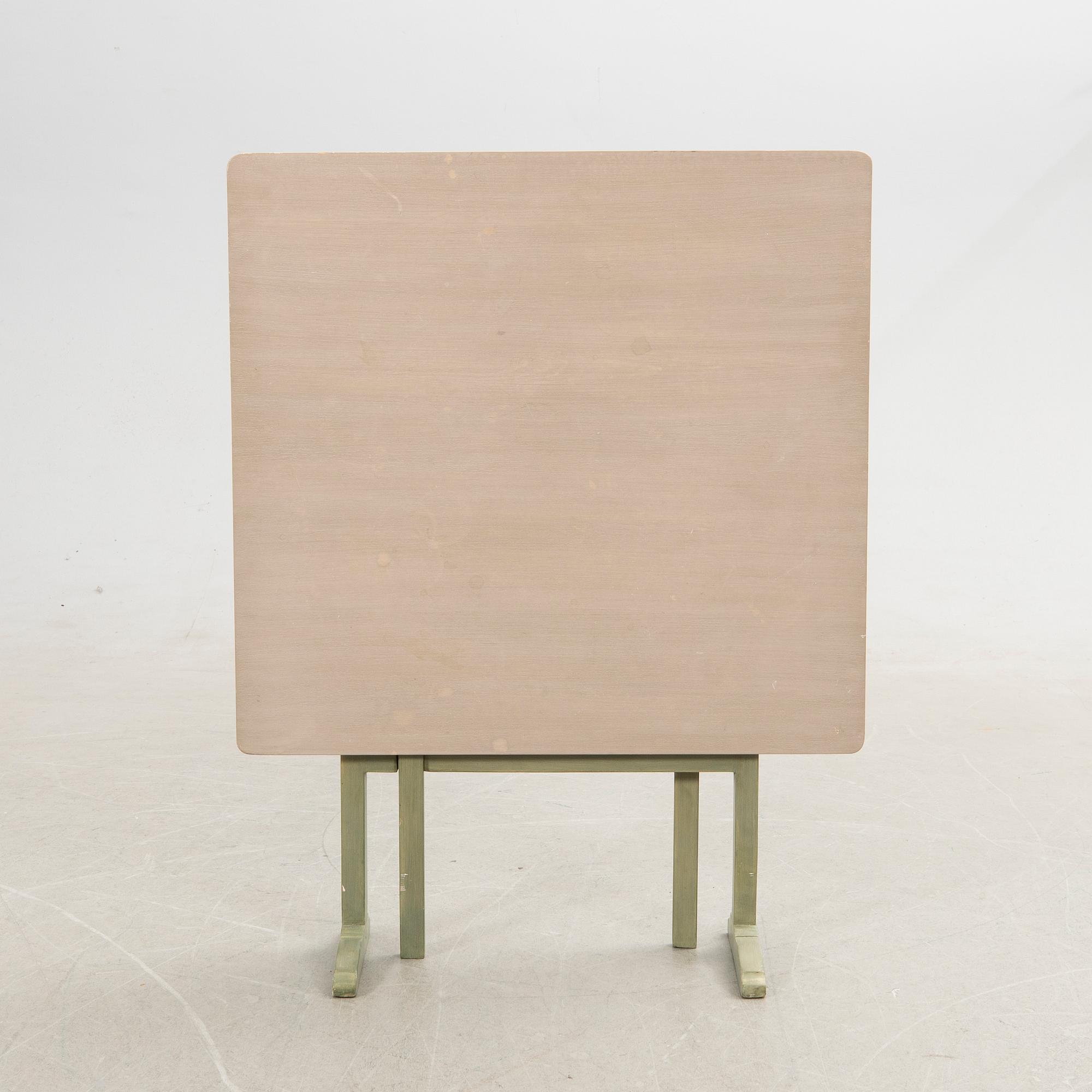 Folding table, early 20th century.