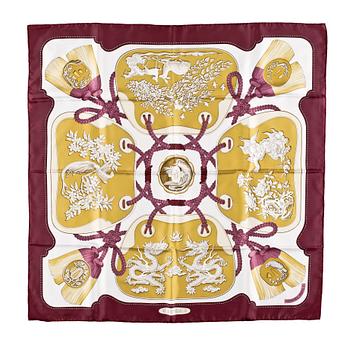 1318. A silk scarf by Hermès, "Tsubas".