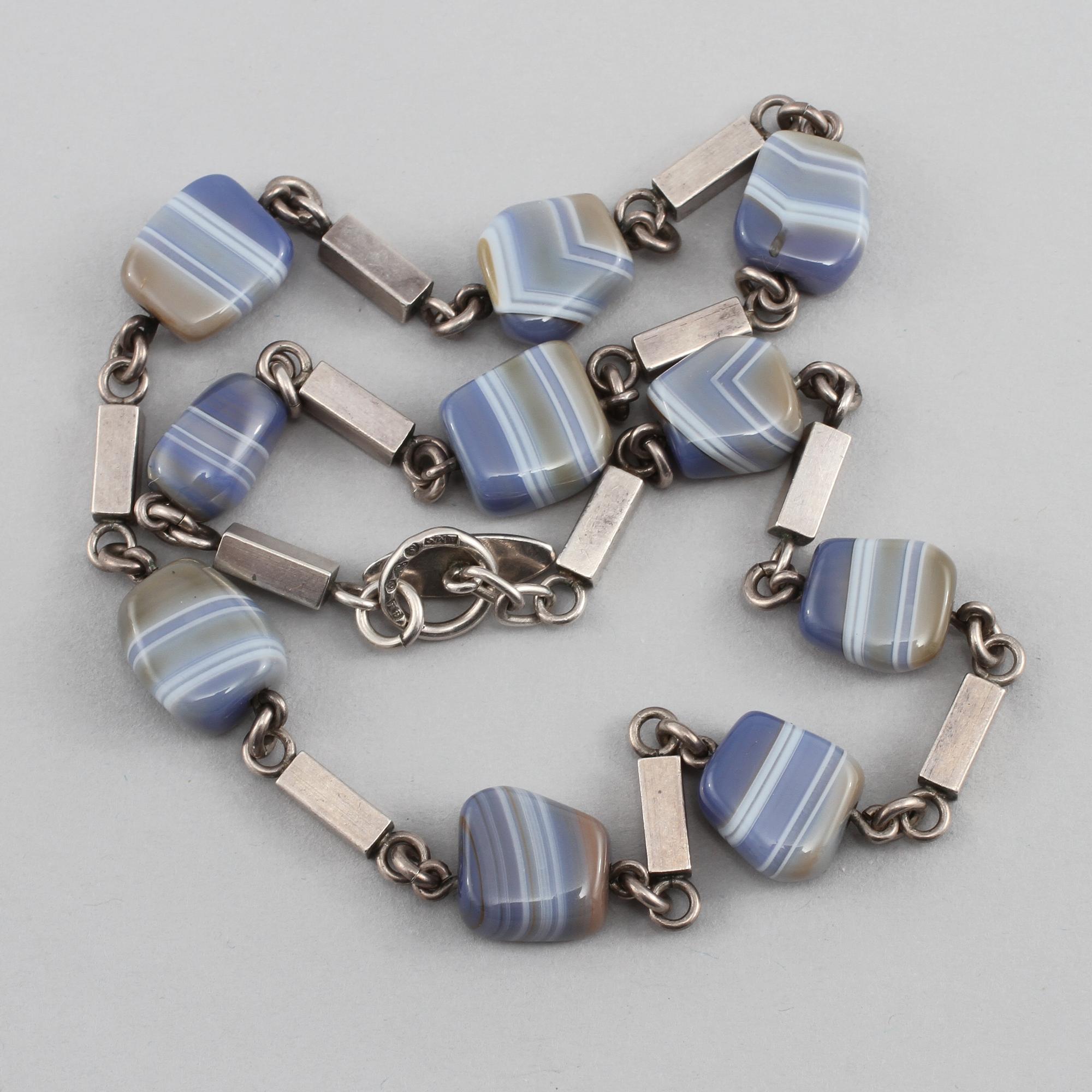 COLLIER, silver samt agater, Arvo Saarela, Enköping, 1960. Vikt 40 g.
