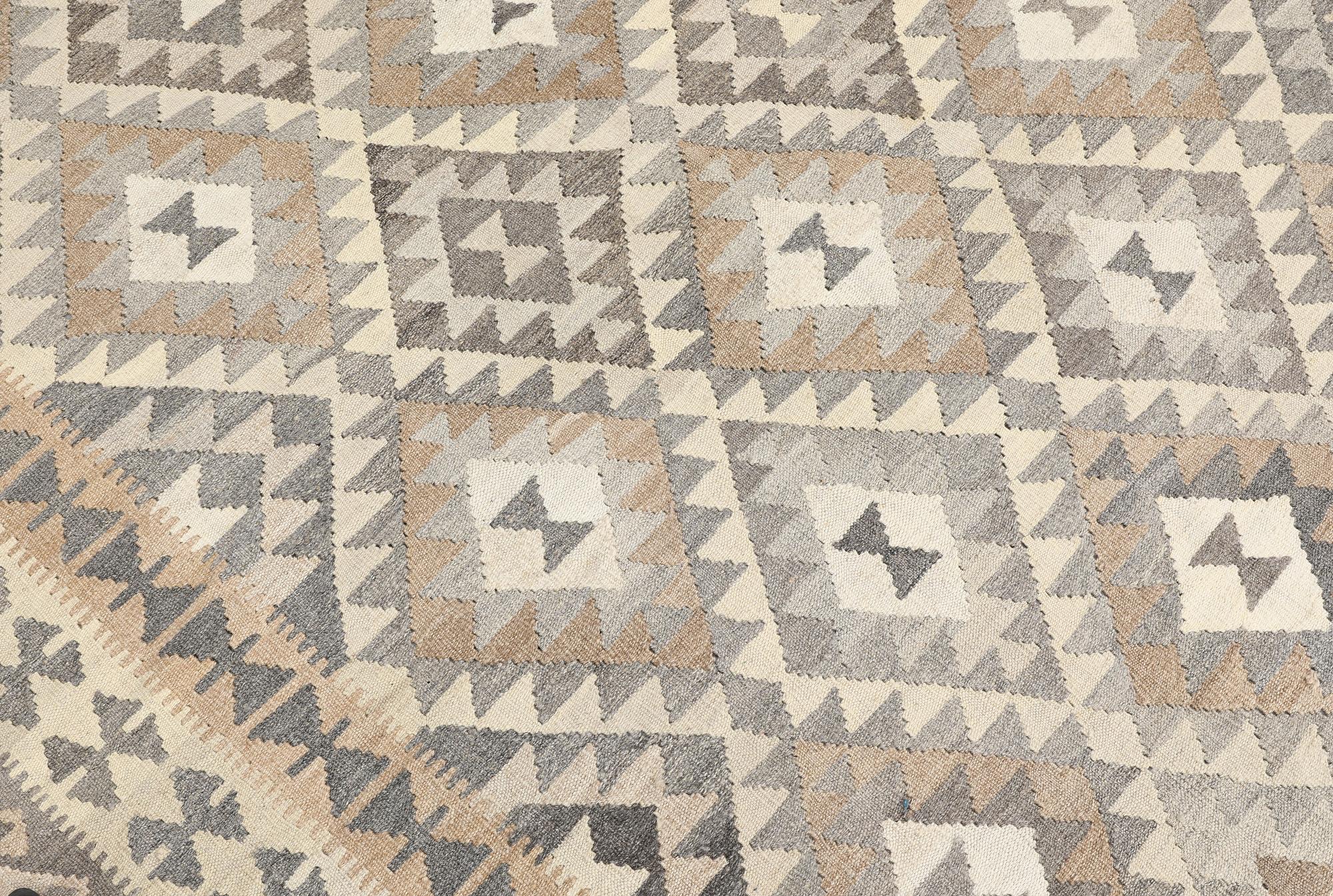 A Kilim rug, approx. 296 x 183 cm.