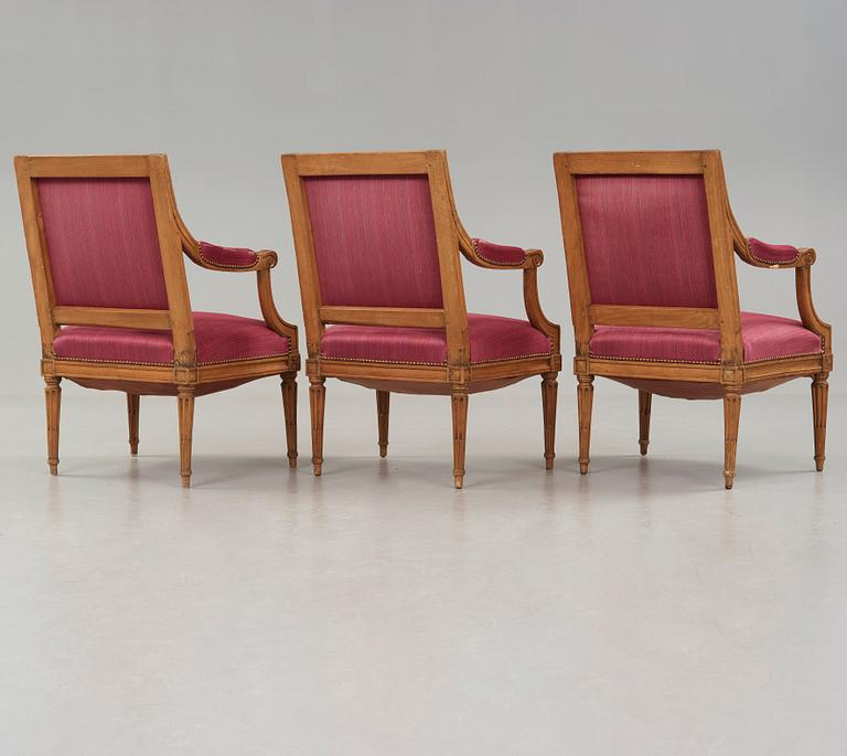 Three Louis XVI late 18th century armchairs.