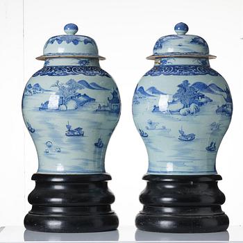 A pair of large blue and white vases with covers, Qing dynasty, Qianlong (1736-95).