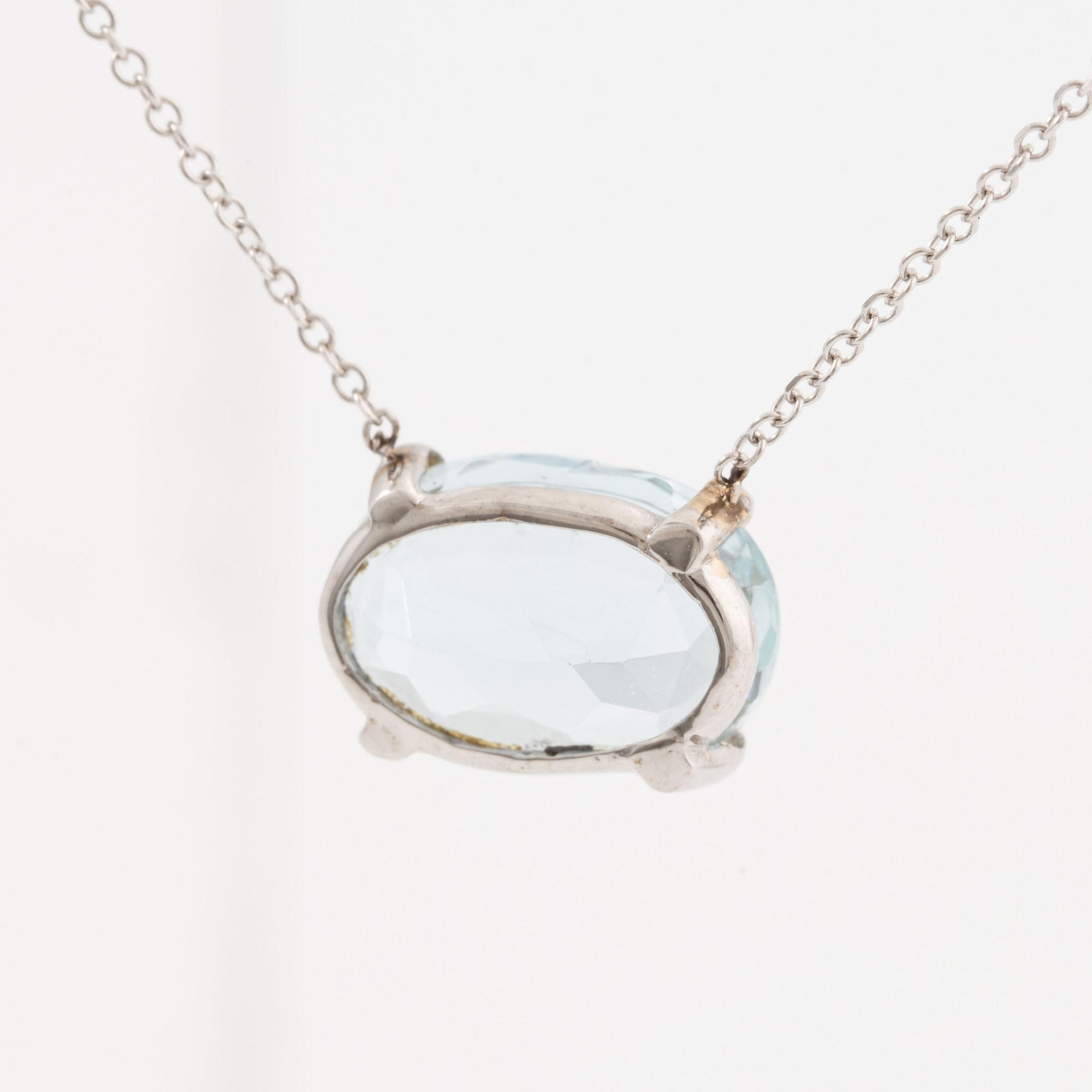 Necklace, 18K white gold with oval-cut aquamarine.