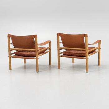 Arne Norell, a pair of 'Sirocco' armchairs with table top, Norell Möbel AB.