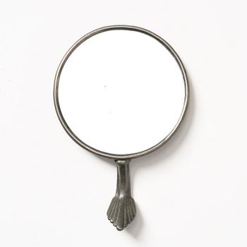 Nils Fougstedt, a pewter hand mirror model A 508, Firma Svenskt Tenn, Stockholm, 1920s-30s.