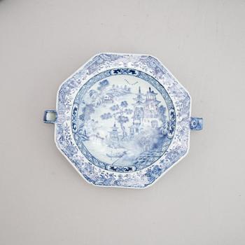 A group of four Chinese blue and white warming plates (2+1+1), Qing dynasty, 18th/19th century.