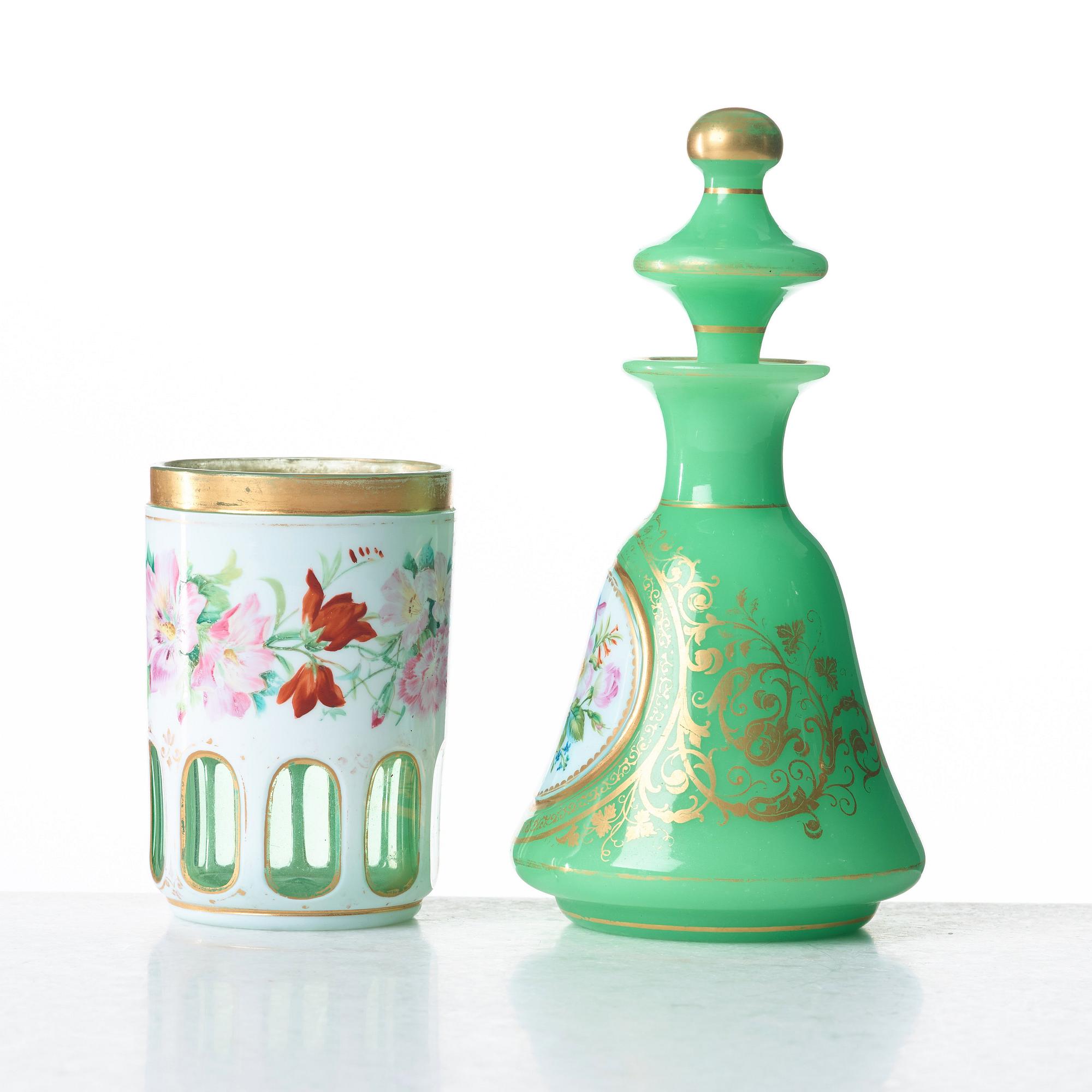 A green bottle with stopper and a beaker glass, Russia, 19th Century.