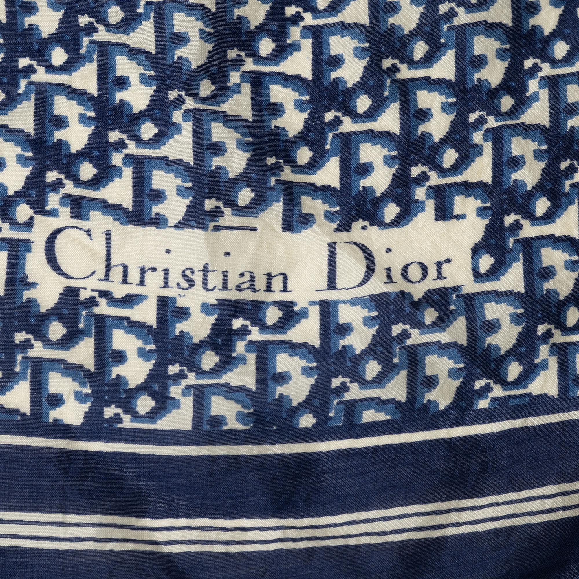 Christian Dior, a clutch and a scarf.