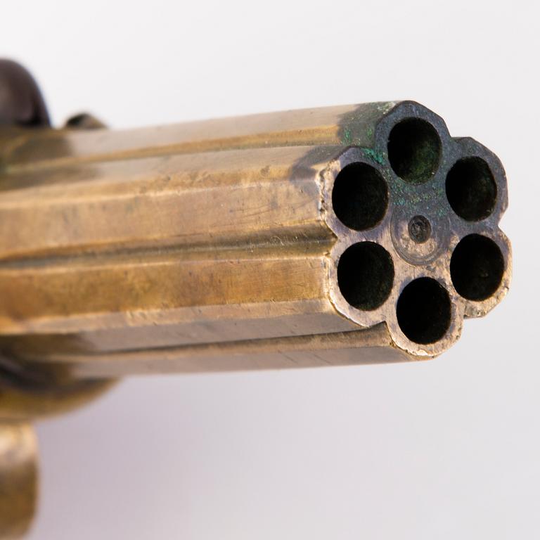 A second half of the 19th Century brass percussion revolver by Johan Engholm.