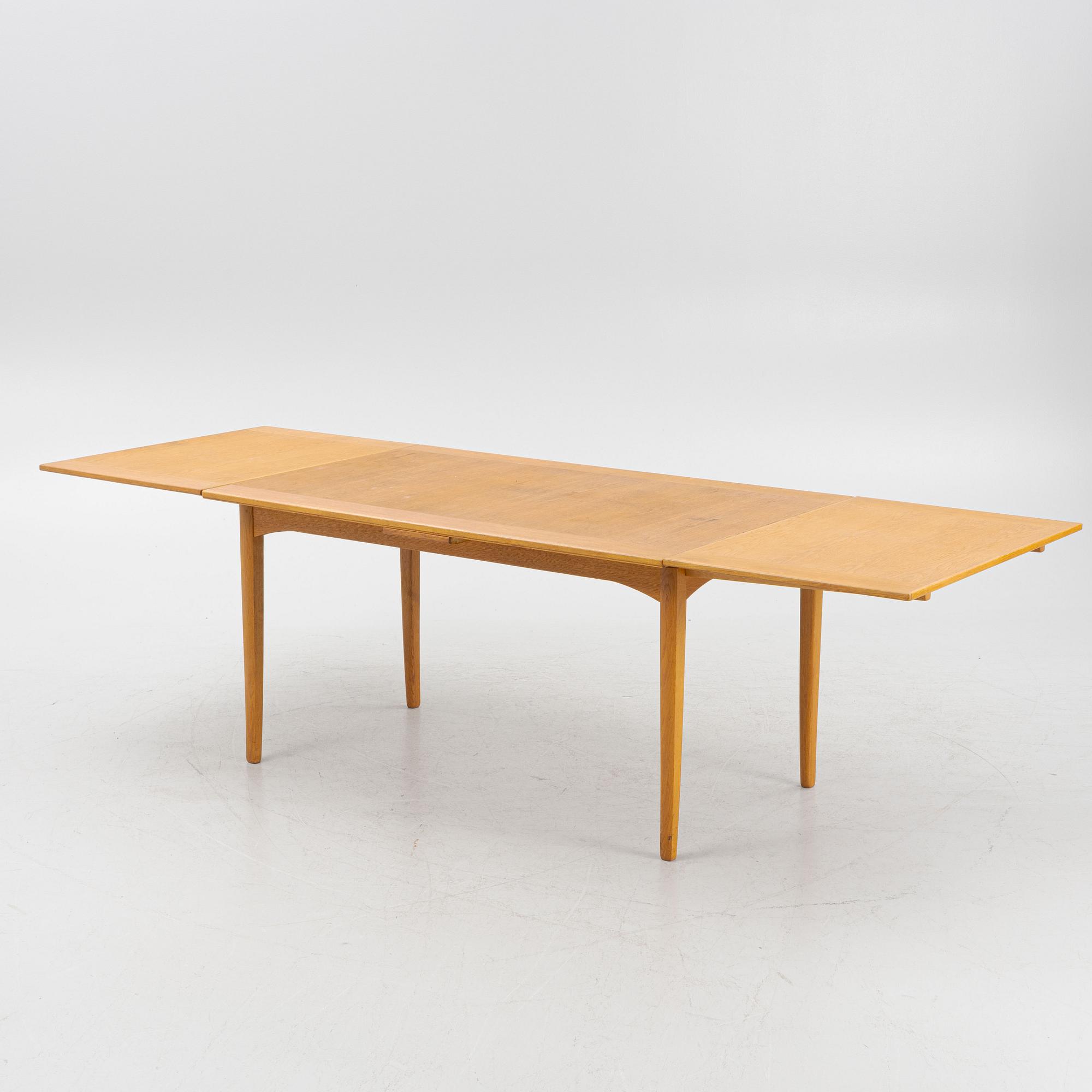 Carl Malmsten, dining table, "Calamare Nyckel", second half of the 20th century.