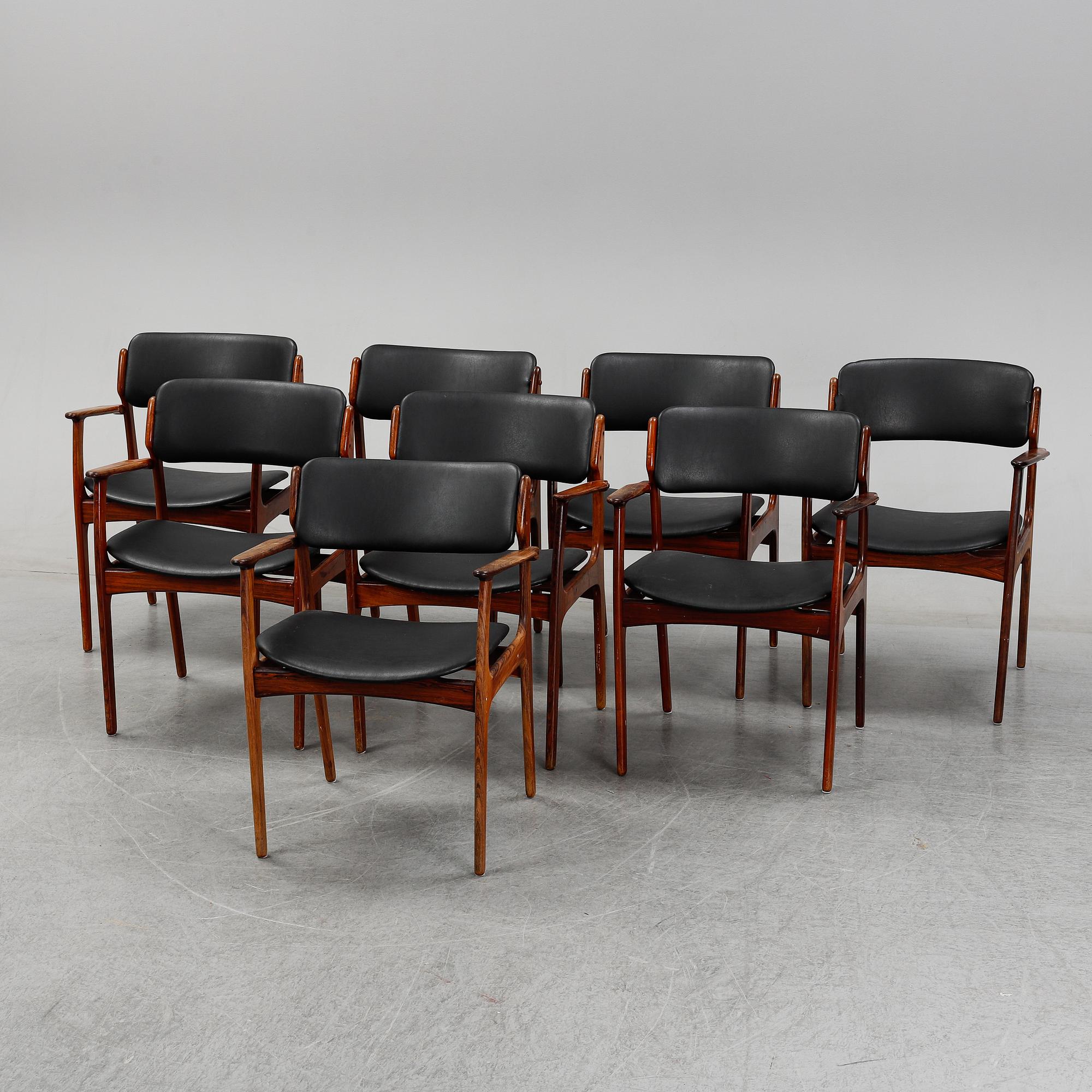 Eight rosewood armchairs by Erik Buch for Oddense Maskinsnedkeri A-S.