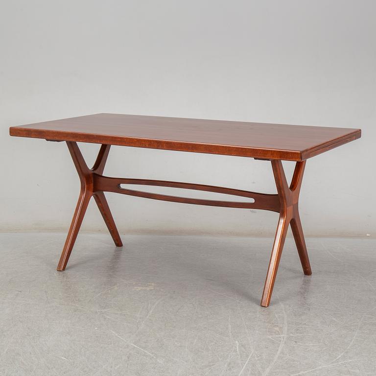 A mid 20th Century dinner table.