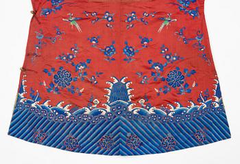 A Chinese semi-formal embroidered silk robe, late Qing dynasty, circa 1900.