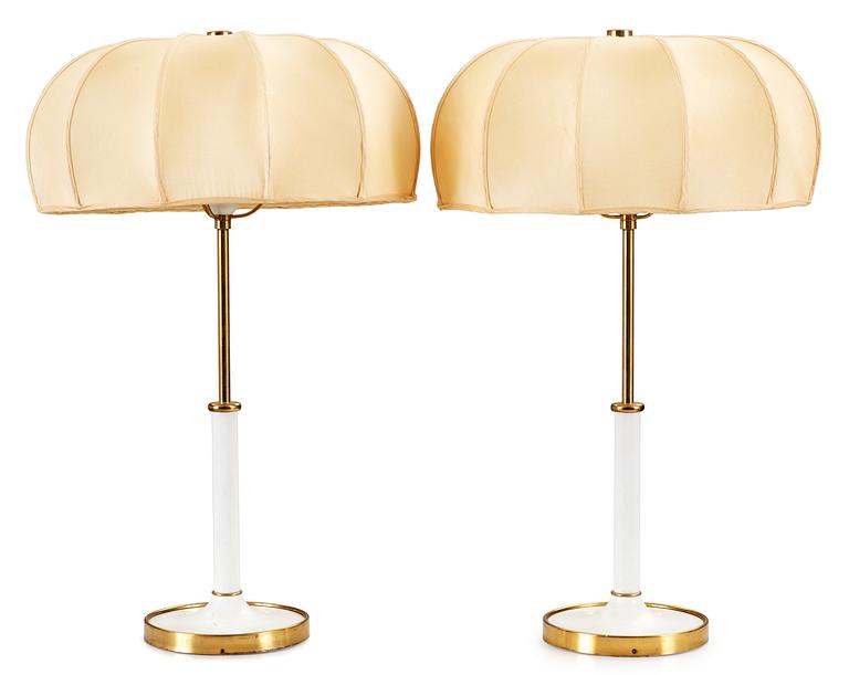 A pair Josef Frank brass and white lacquered table lamps, Svenskt Tenn, model 2466.
