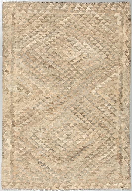 A kelim rug, 242 x 167 cm.