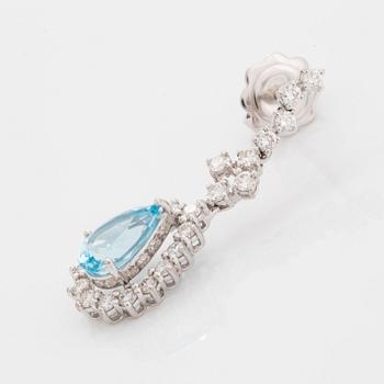 Topaz and brilliant-cut diamond earrings.