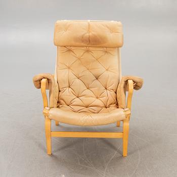 A Bruno Mathsson "Pernilla" leather easy chair for DUX later part of the 20th century.