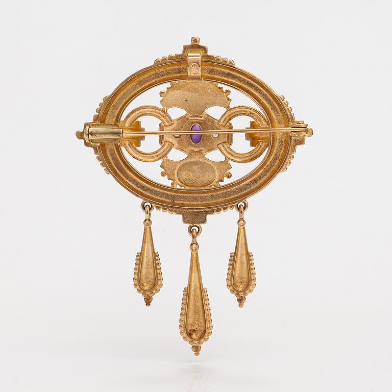 Otto Roland Mellin, A 14K gold brooch/pendant "Memory" with cultured pearls and an amethyst. Kalevala Koru, Helsinki 199.
