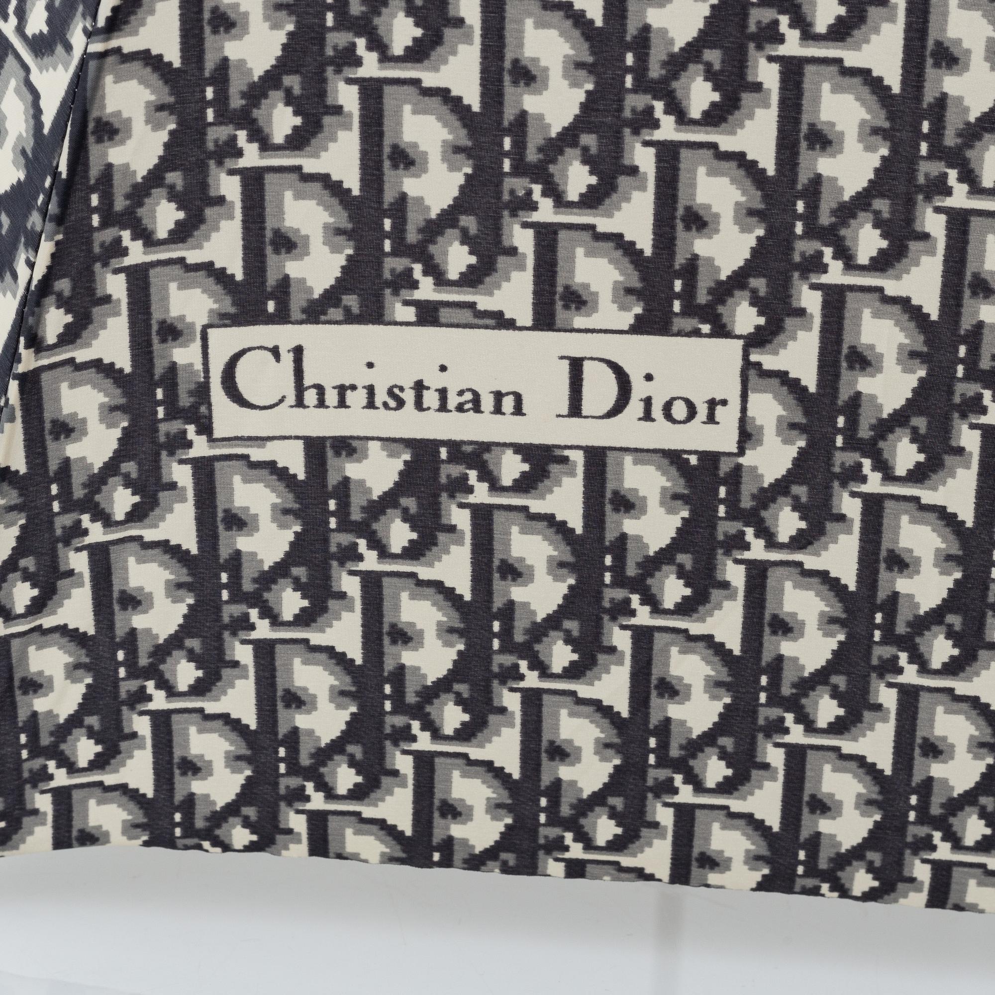 Christian Dior, weekendväska med paraply.