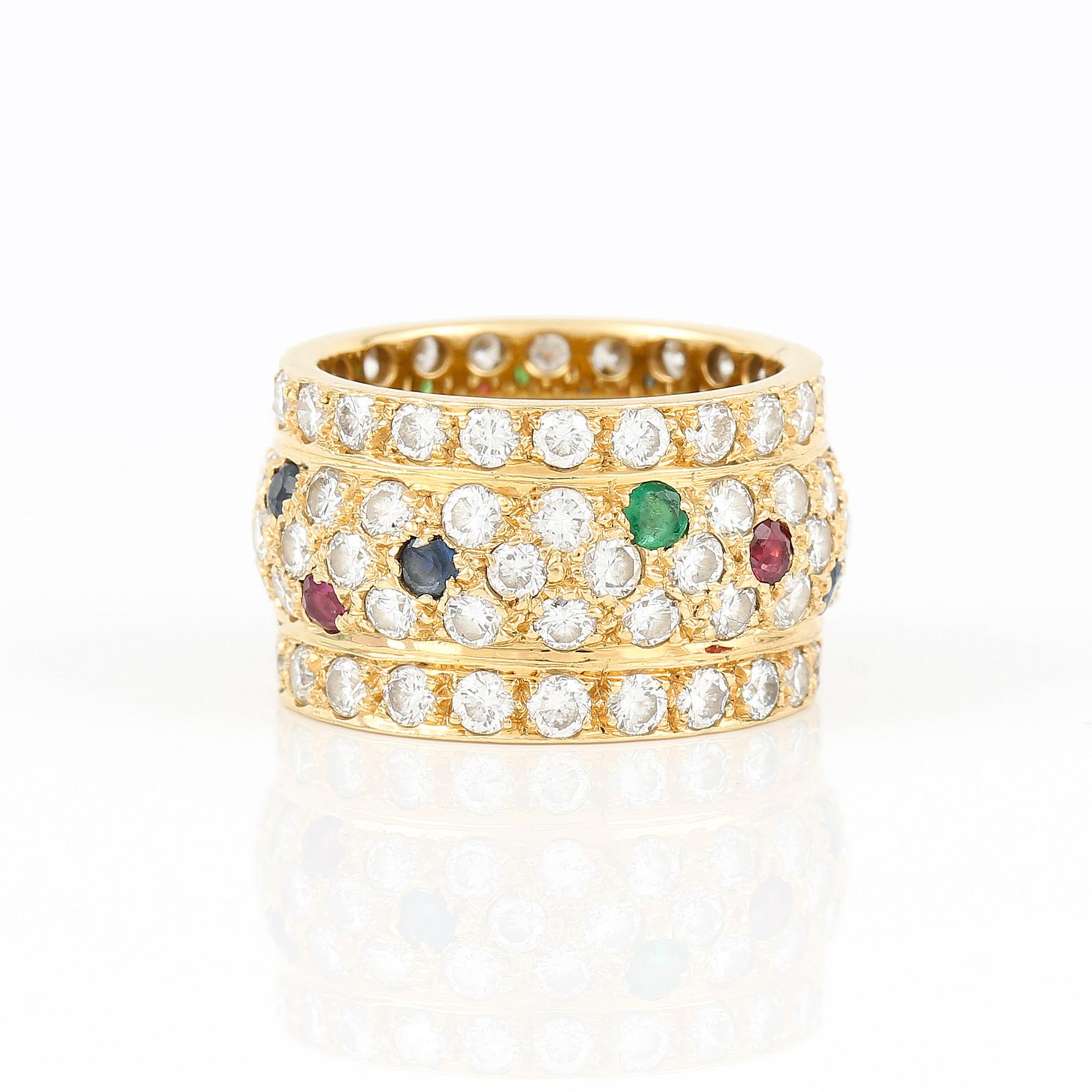 RING, 18K guld med 80 st briljantslipade diamanter tot ca 2,40 ct, rubiner, smaragder och safirer. Vikt 6,5 g.