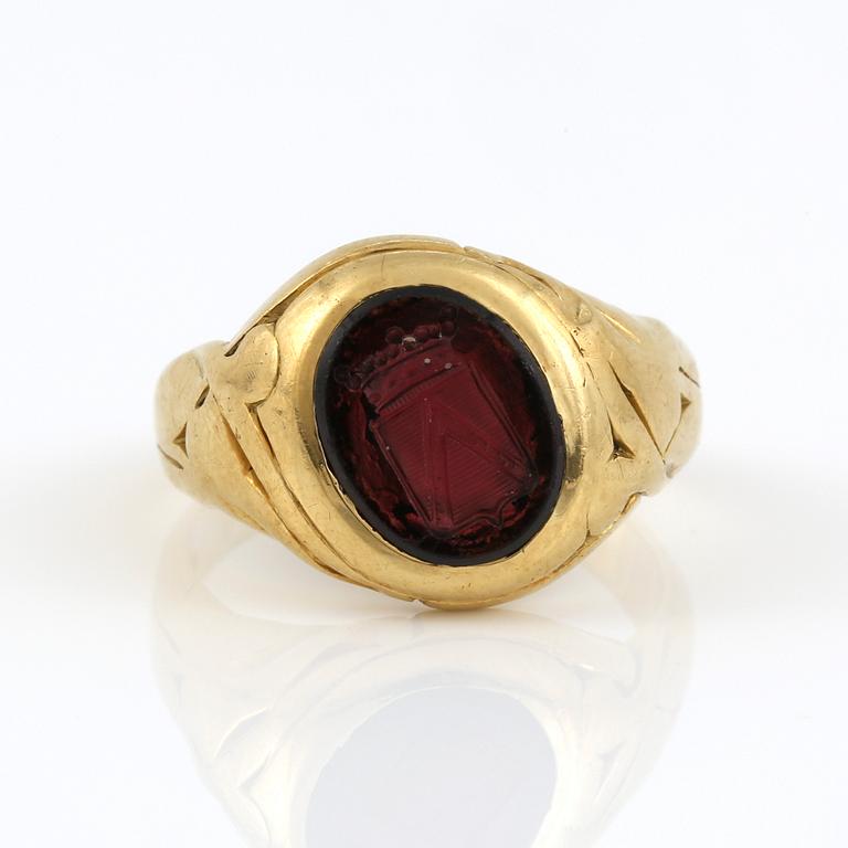 VAPENRING, 14 K, granat ca 3,49 ct. Vikt 10,01 g.