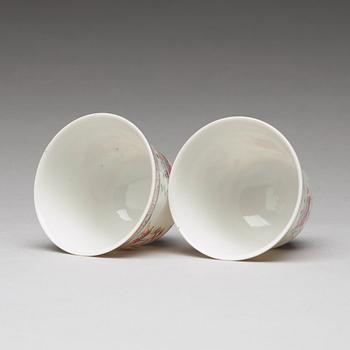 A pair of Chinese famille rose ba jixiang wine cups, Republic, with Guangxu six character mark.