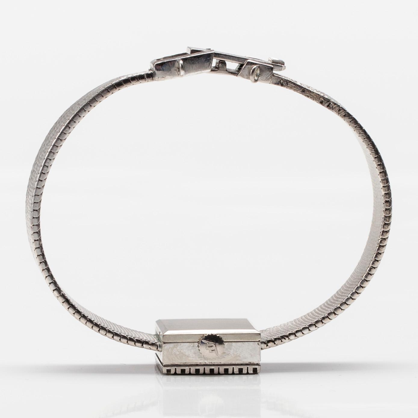 ARMBANDSUR, dam, Movado, 14K vitguld, 24 diamanter. Schweiz. Vikt tot. 35 g.