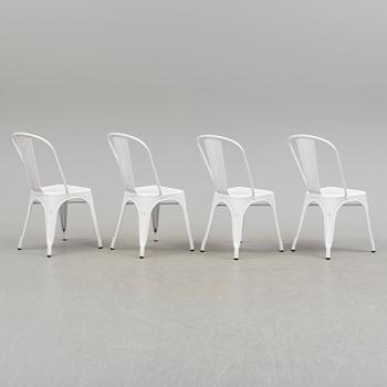 A set of four Tolix chairs.
