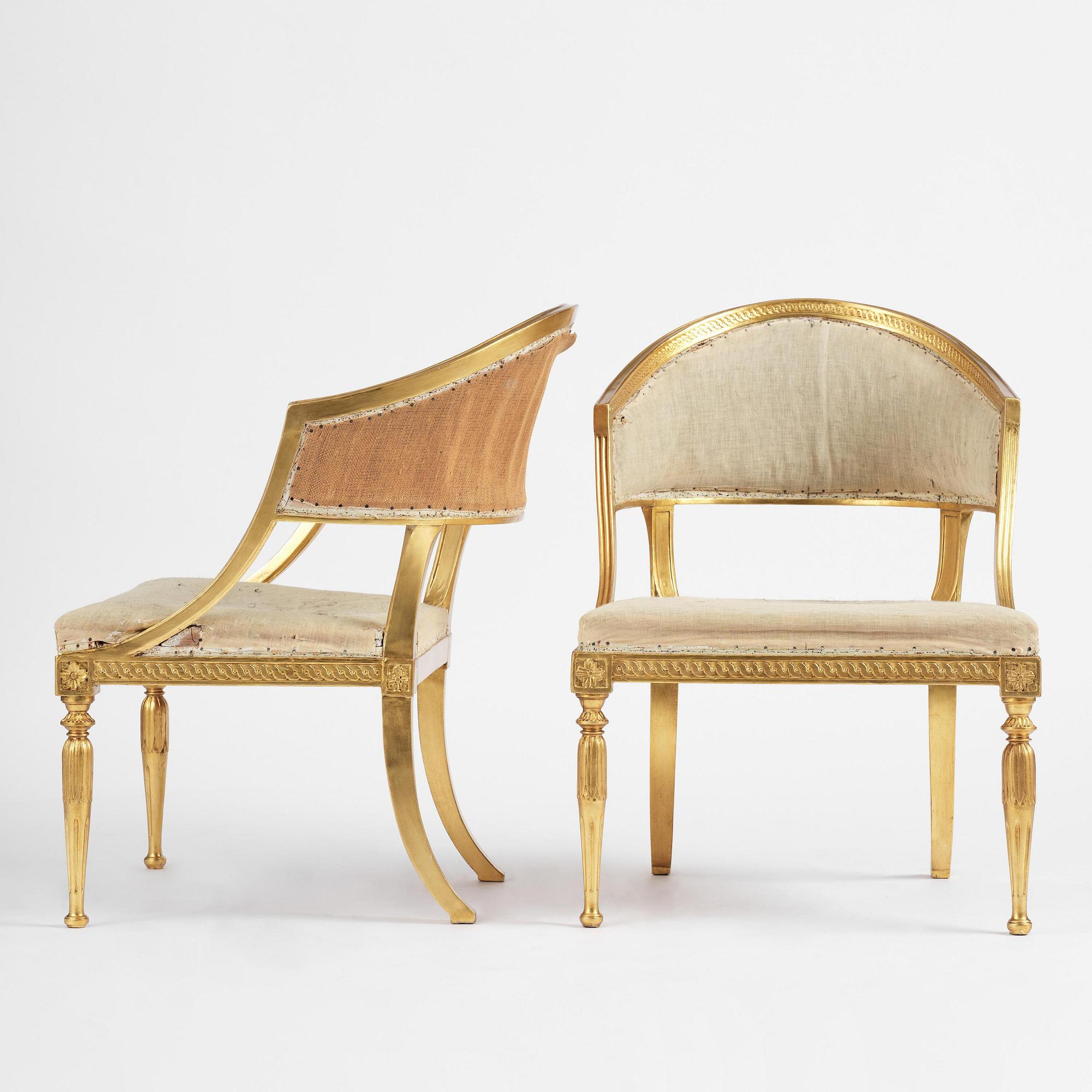 A pair of late Gustavian giltwood open-back armchairs, Stockholm, late 18th century.