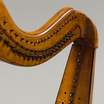 A birch and pine harp from Northern Europe, first half of the 19th century.