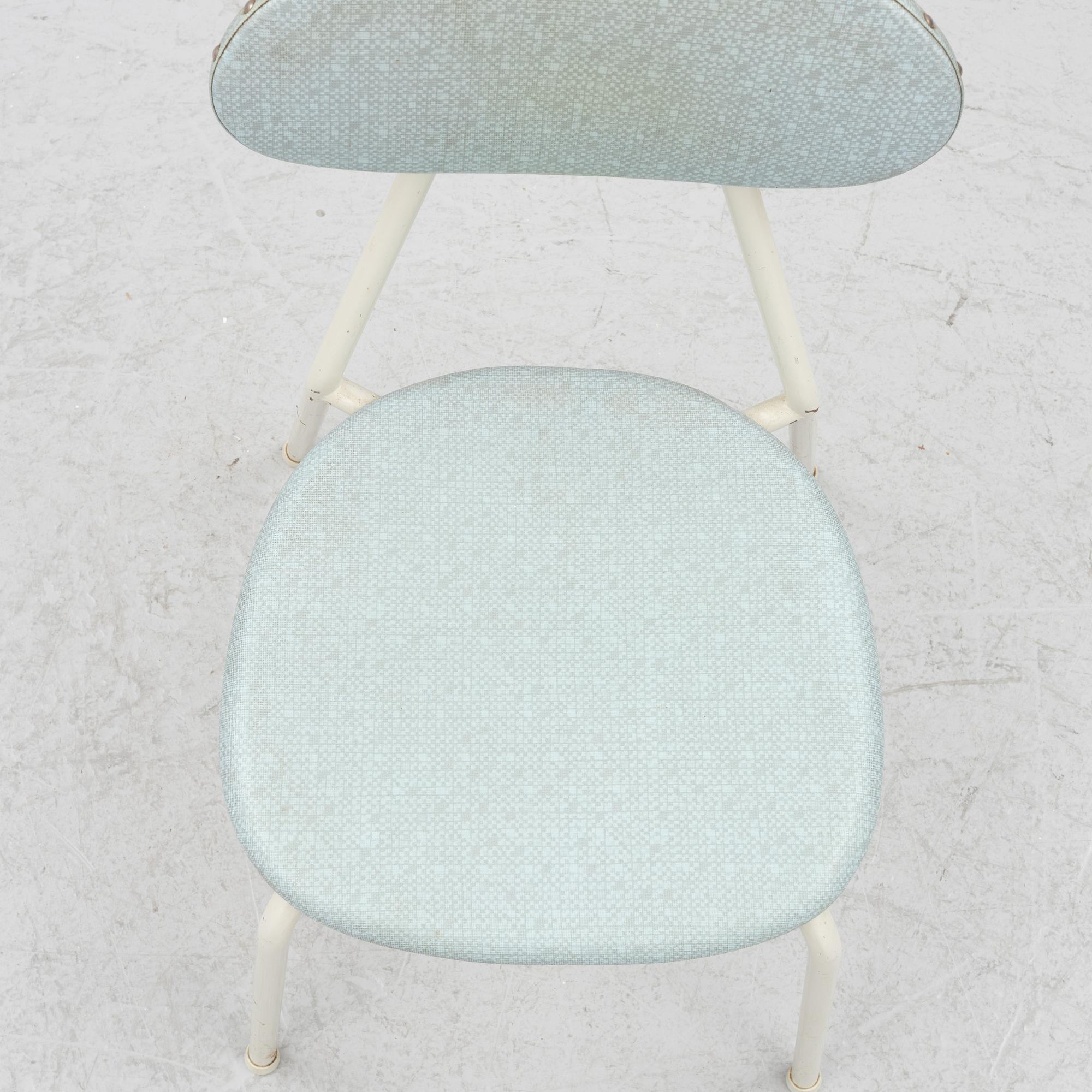 A table and four chairs, mid-20th Century.