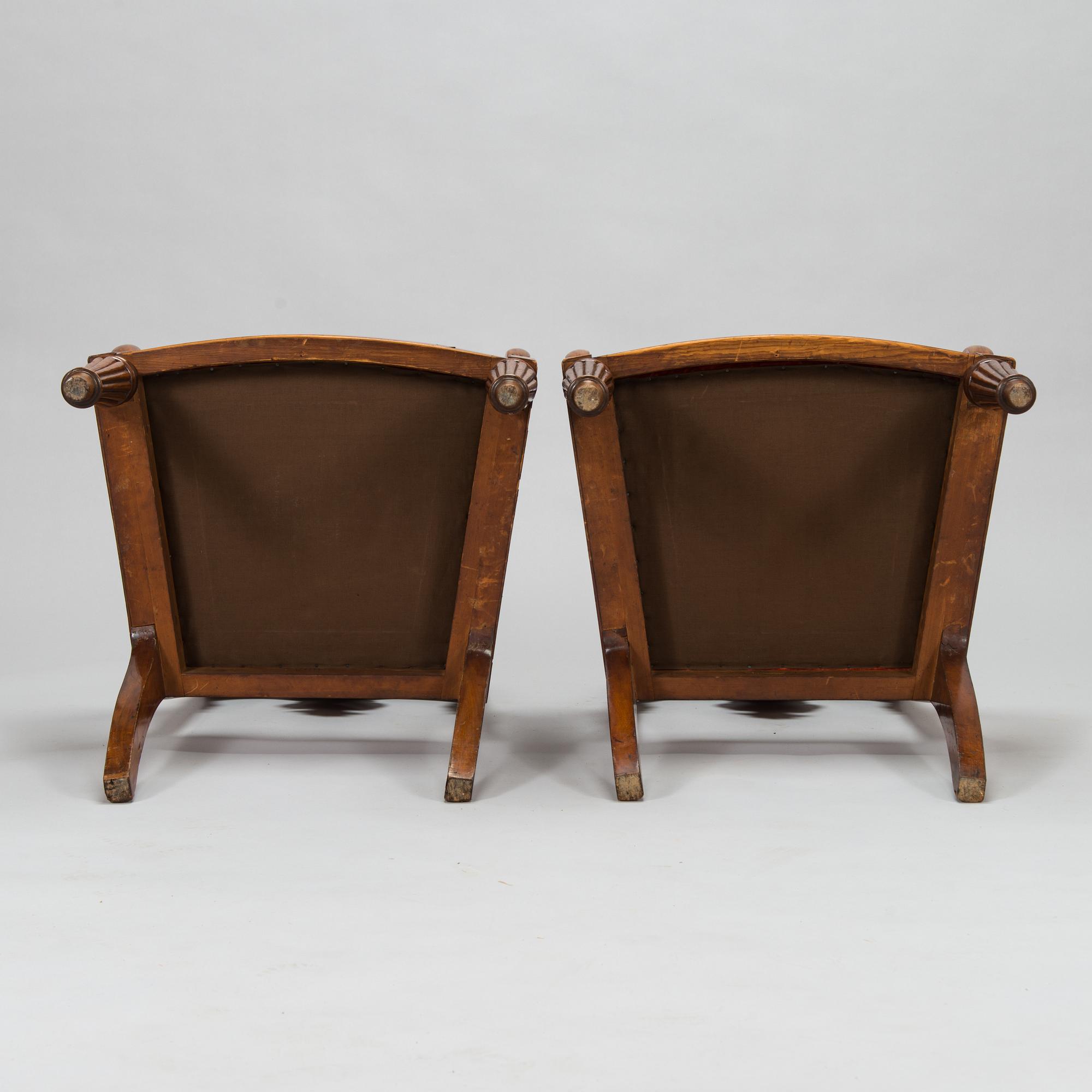 A pair of Baltic open armchairs from around 1820.