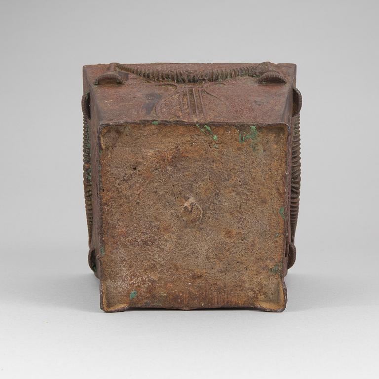 An early 19th century flower pot of cast iron.