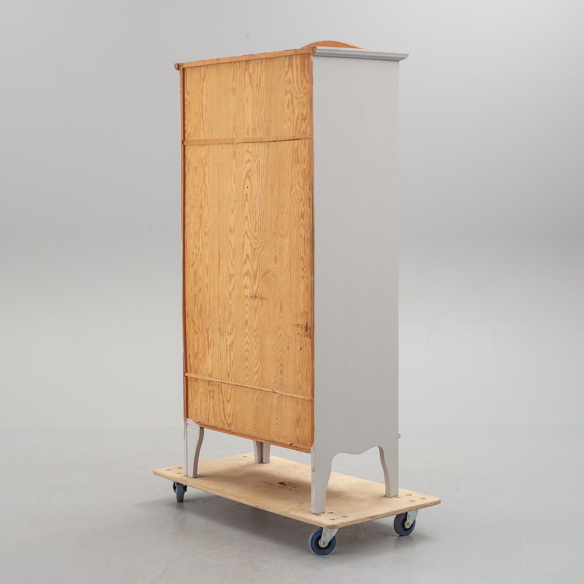 A first half of the 20th century painted cabinet.