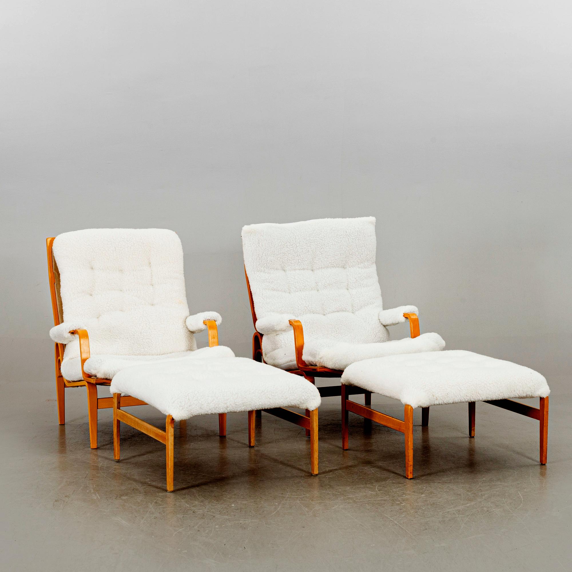 BRUNO MATHSSON, a pair of Ingrid armchairs for DUX later part of the 20th century.